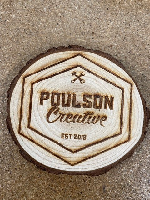 Poulson Creative logo wooden coaster
