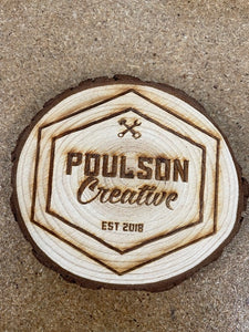 Poulson Creative logo wooden coaster